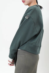 Green pullover in crop cut