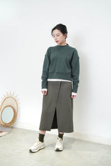 Green pullover in crop cut