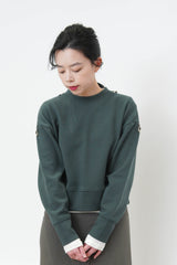 Green pullover in crop cut