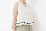 White flare cut vest blouse w/ embroidery