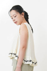 White flare cut vest blouse w/ embroidery