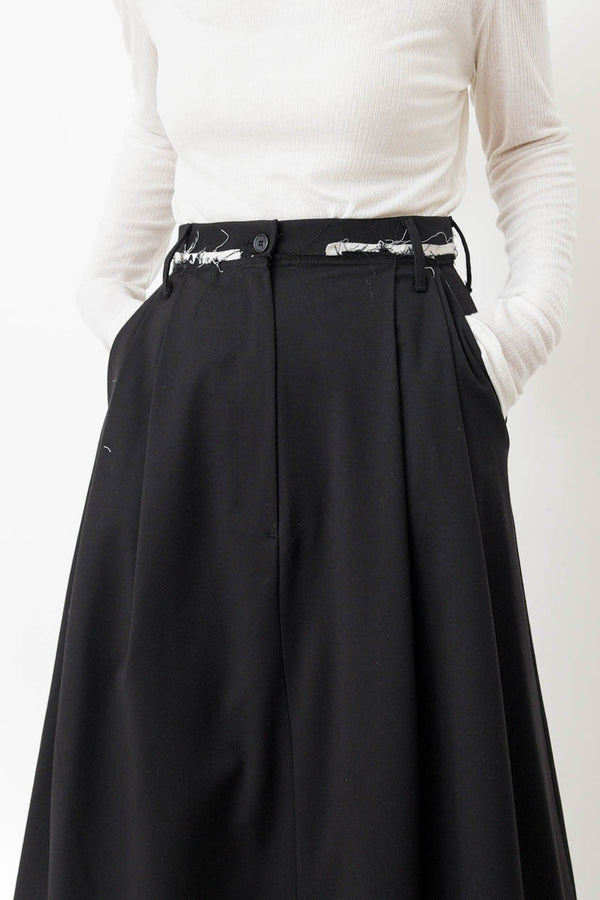 Black A cut skirt in contrast fringe trimmed