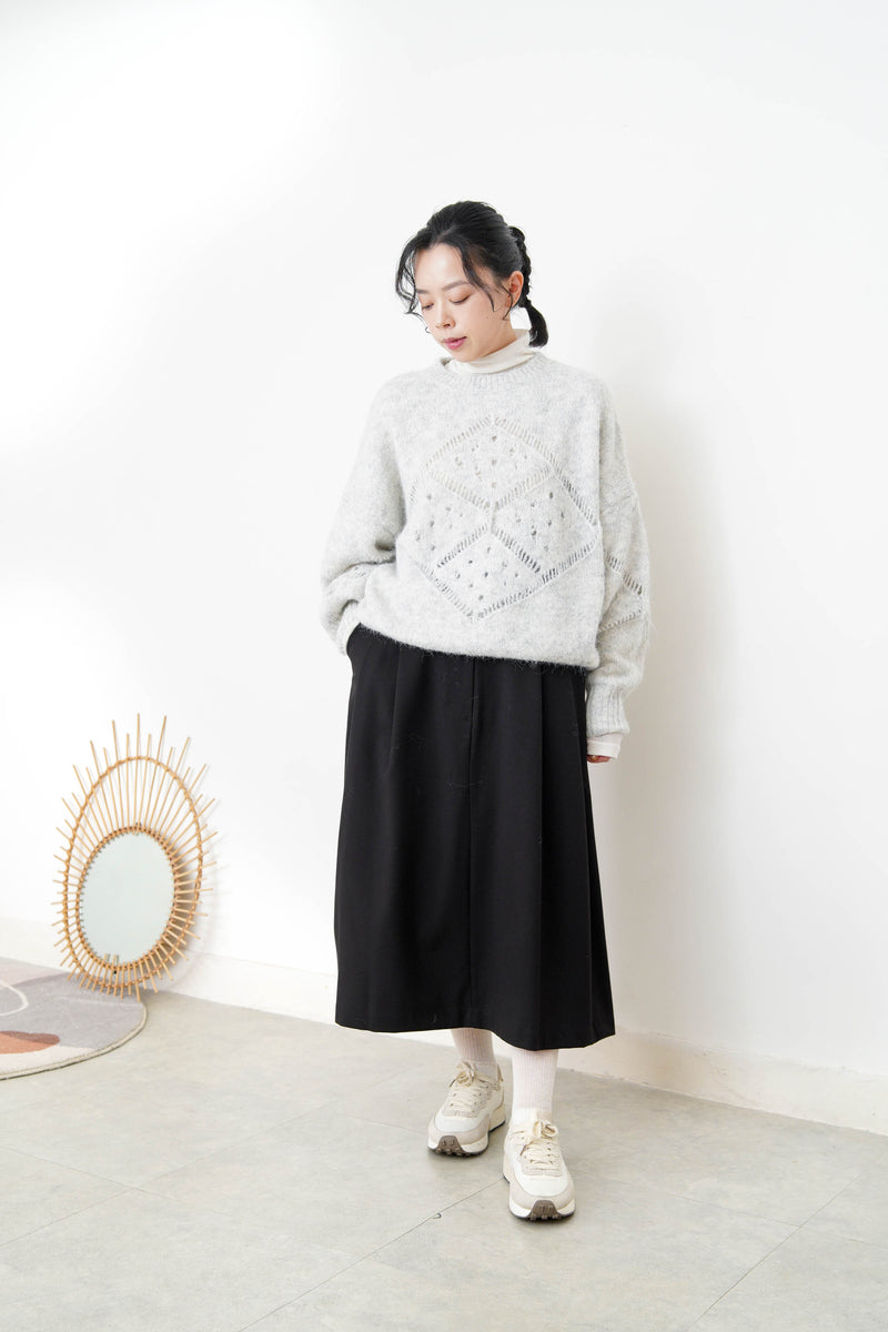 Grey sweater in crochet net details