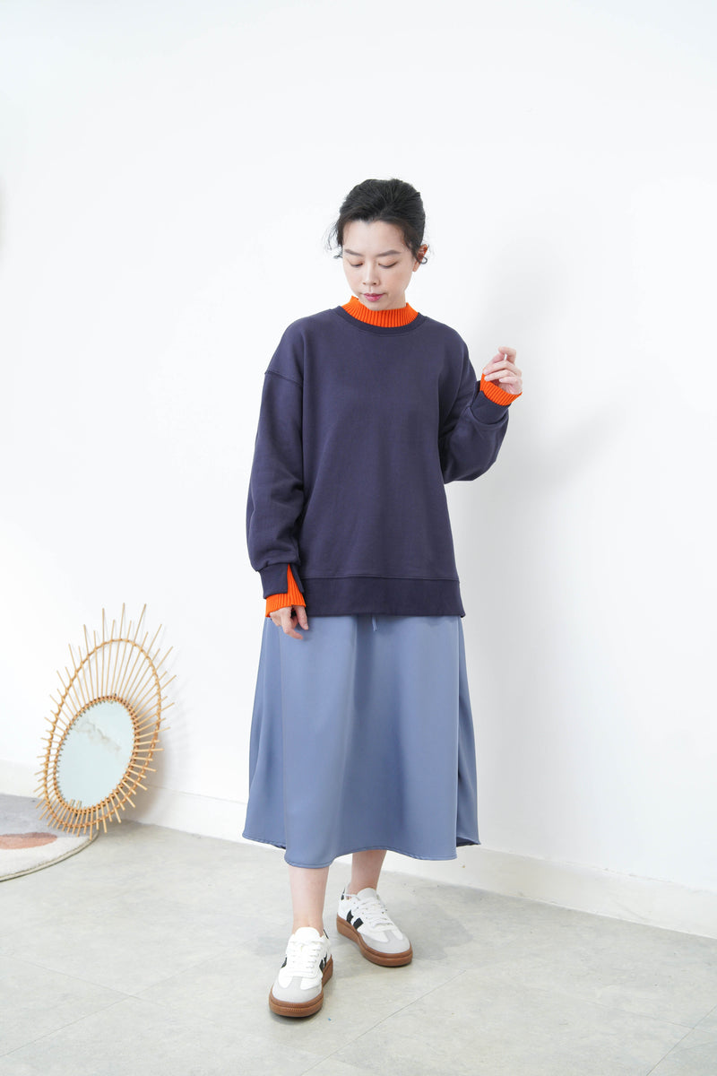 Navy split hem pullover w/ contrast layering