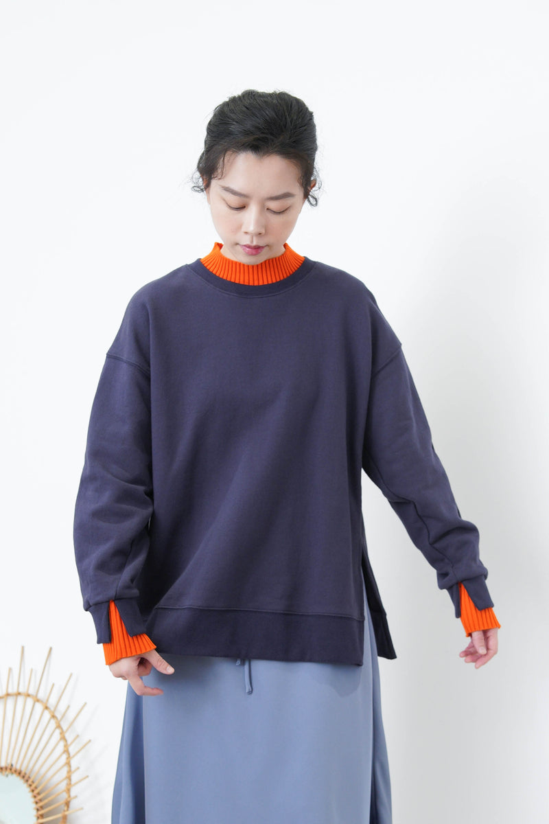 Navy split hem pullover w/ contrast layering