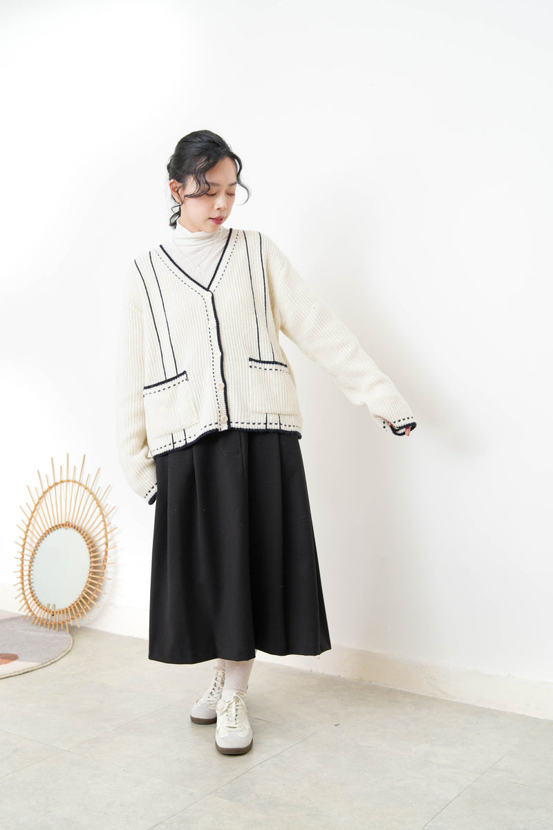 Black A cut skirt in contrast fringe trimmed