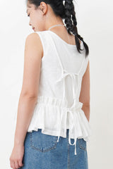 White dotted pattern vest w/ peplum hem