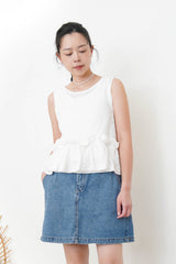 White dotted pattern vest w/ peplum hem