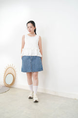White dotted pattern vest w/ peplum hem