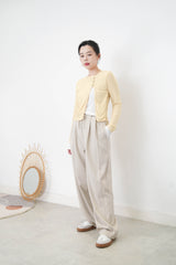 Light beige wide leg trousers w/ strings and buttons