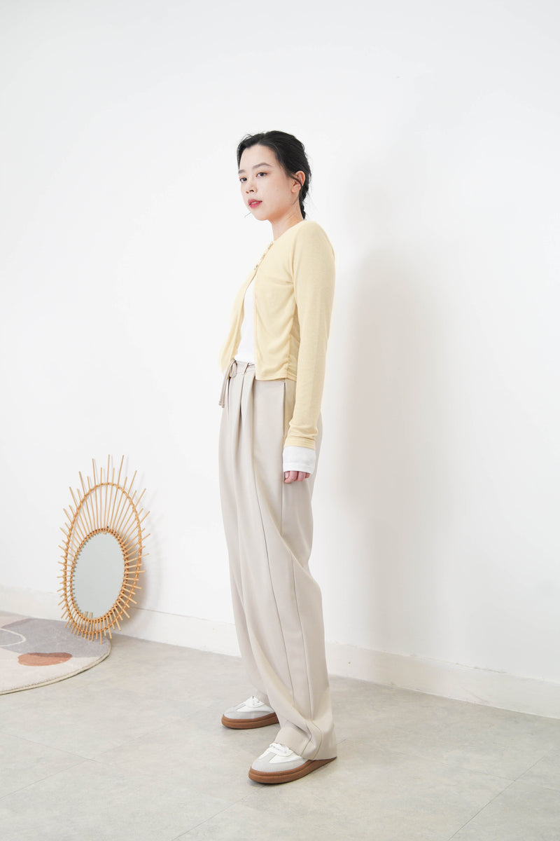 Light beige wide leg trousers w/ strings and buttons