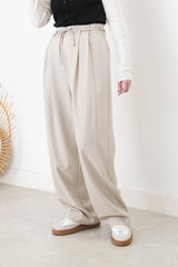 Light beige wide leg trousers w/ strings and buttons