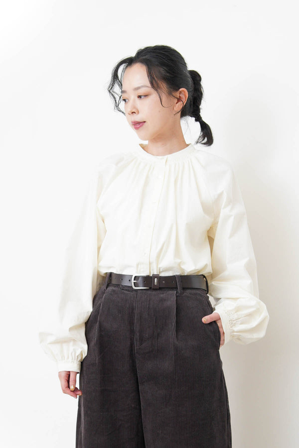 White shirt in detail pleats