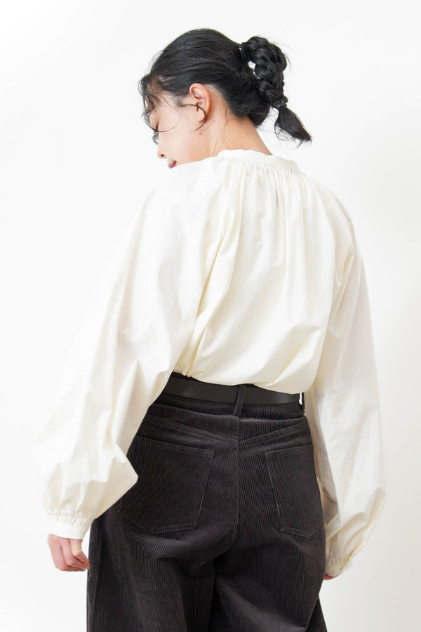 White shirt in detail pleats