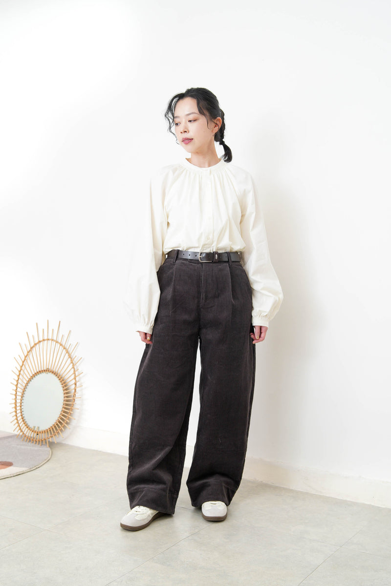 White shirt in detail pleats