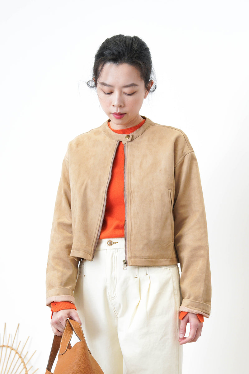 Orange wool top in buttons sleeves