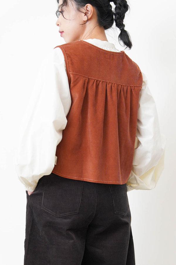 Orange brown corduroy vest
