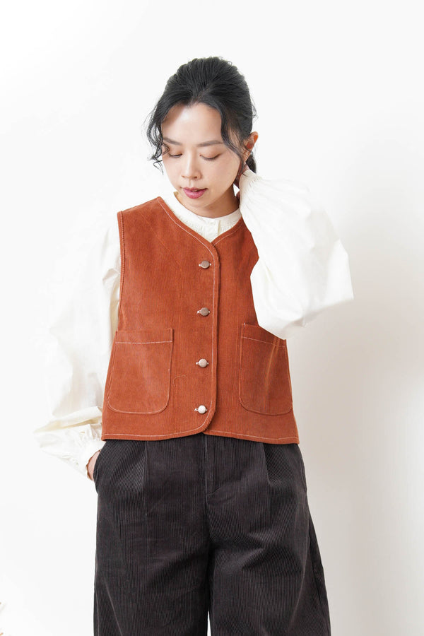 Orange brown corduroy vest