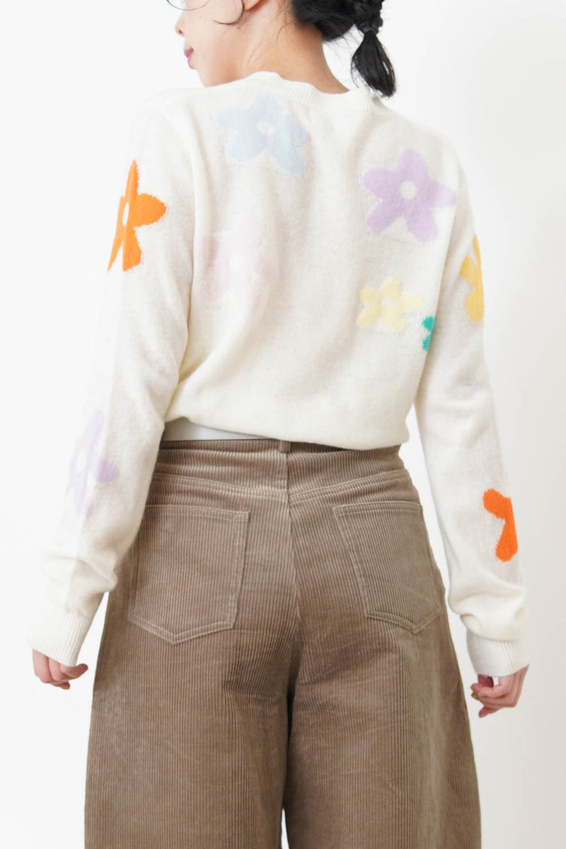 white knit top with floral pattern