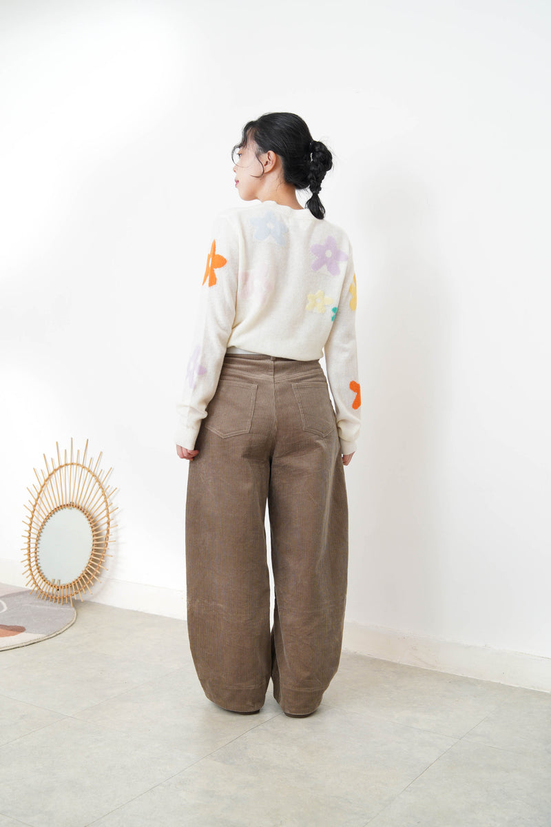 white knit top with floral pattern