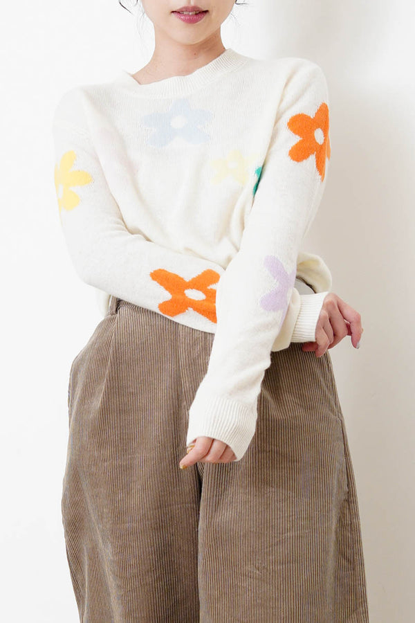 white knit top with floral pattern