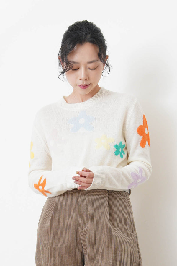 white knit top with floral pattern