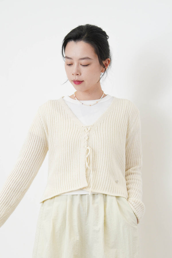 Ivory cardigan w/ strings knot details