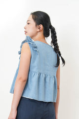 Light blue denim vest w/ ruffle shoulders