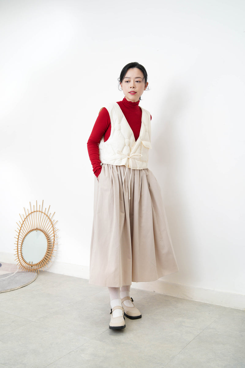 Ivory padded down vest w/ pocket