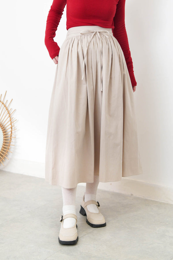 Light beige pleats round skirt w/ straps