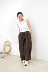 White crochet vest w/ tie string hem