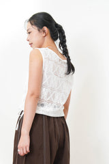 White crochet vest w/ tie string hem