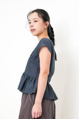 Navy V neck blouse in peplum hem