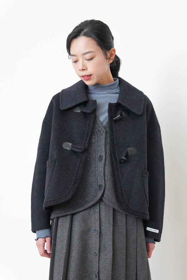 Black 90% handmade wool jacket w/ knit trimmed details