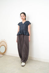 Navy V neck blouse in peplum hem