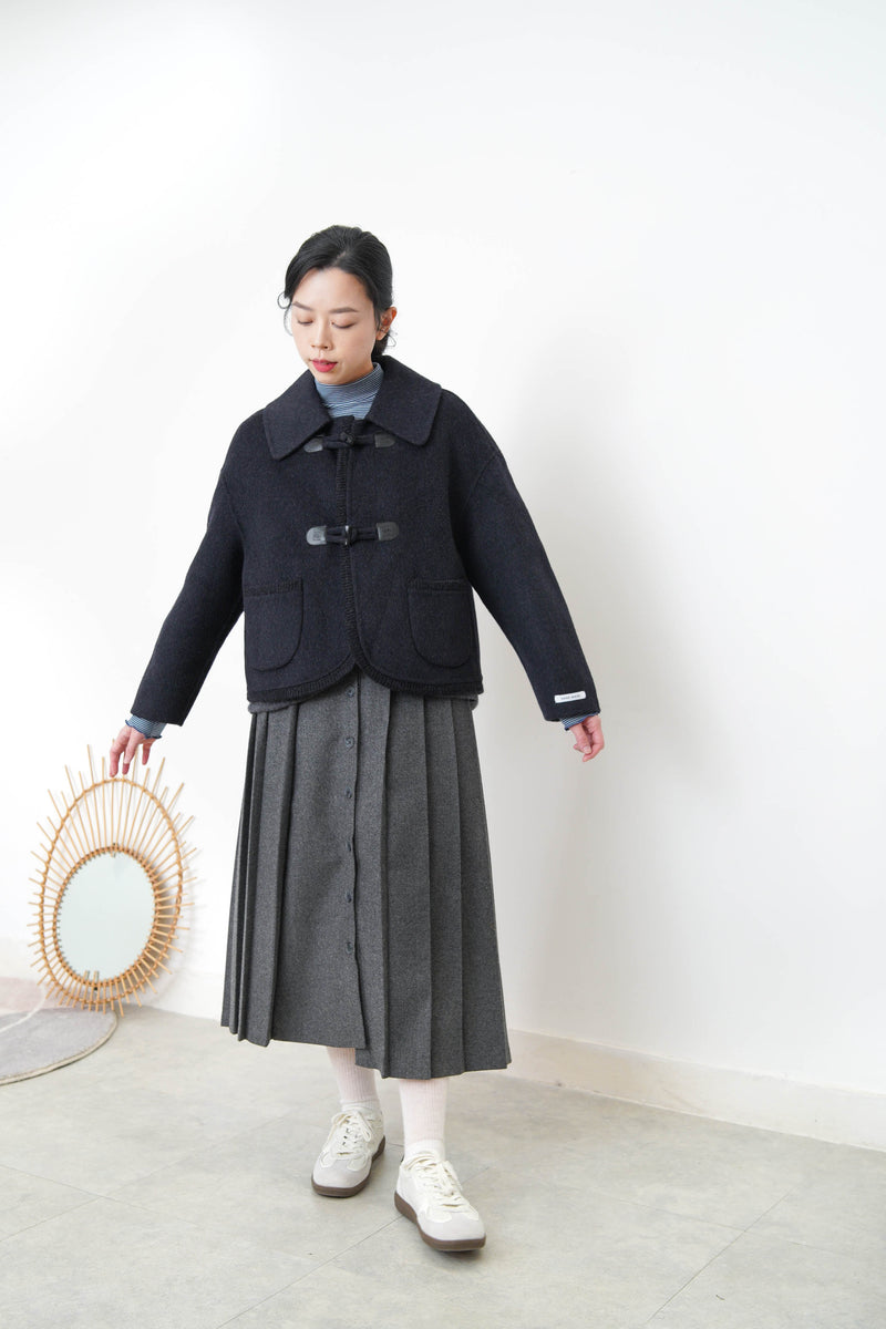 Black 90% handmade wool jacket w/ knit trimmed details