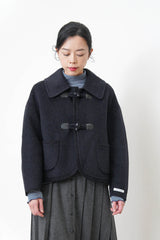 Black 90% handmade wool jacket w/ knit trimmed details