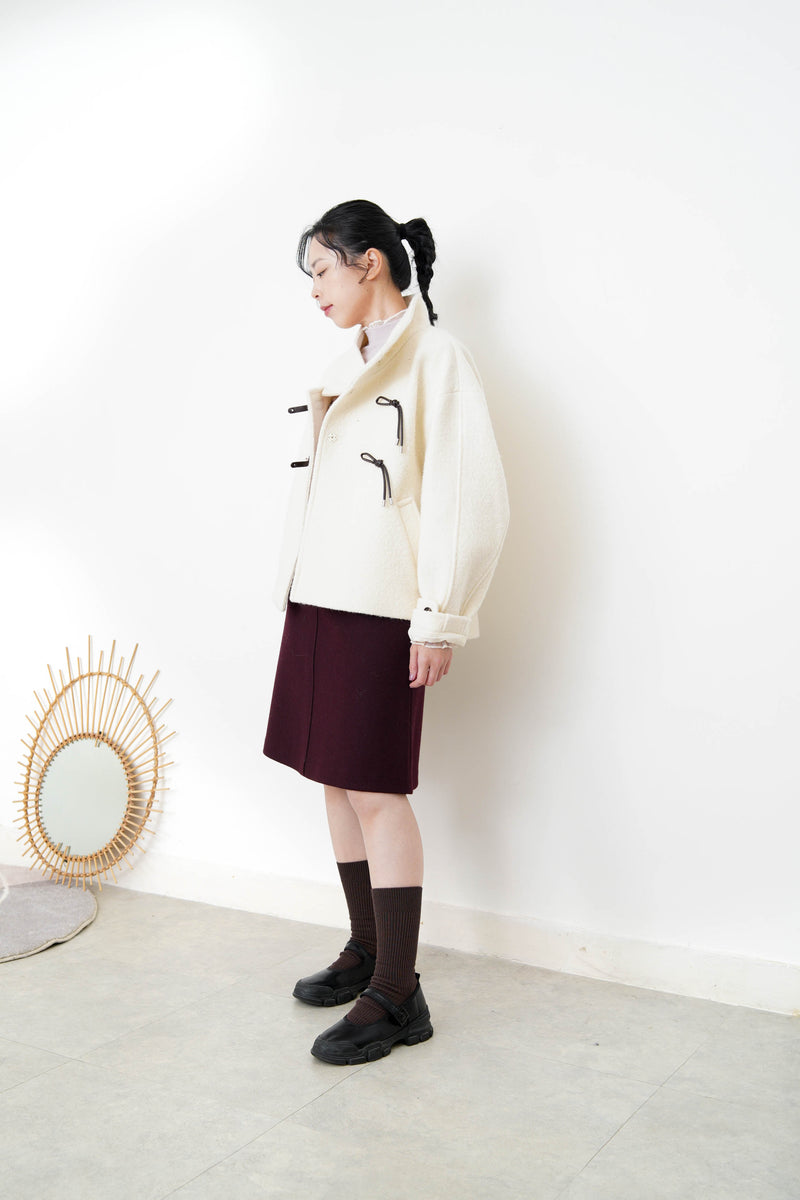 Ivory 100% wool jacket w/ leather buckles