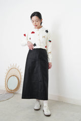 Black faux leather skirt in h cut