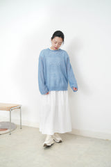 10% wool blue loose cut swaeater in ripped fringe