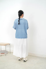 10% wool blue loose cut swaeater in ripped fringe