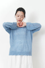 10% wool blue loose cut swaeater in ripped fringe