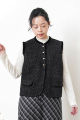 Black knit vest in ruffle fringe