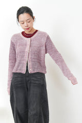 Pink wool yarn cardigan in gradient color