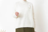 White alpaca wool sweater w/ pins