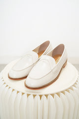 Ivory loafer shoes