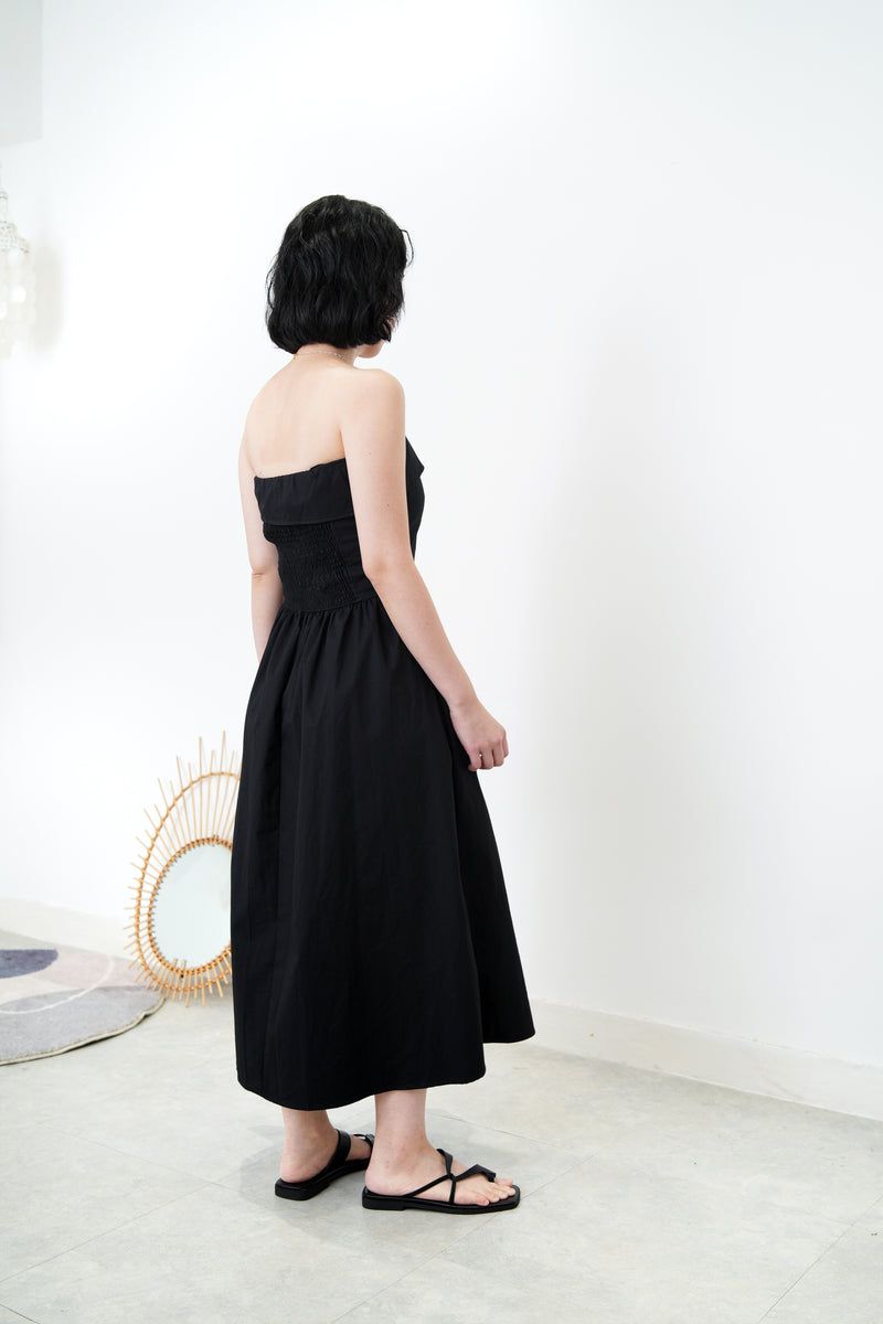 Black layer tube dress in a cut bottom