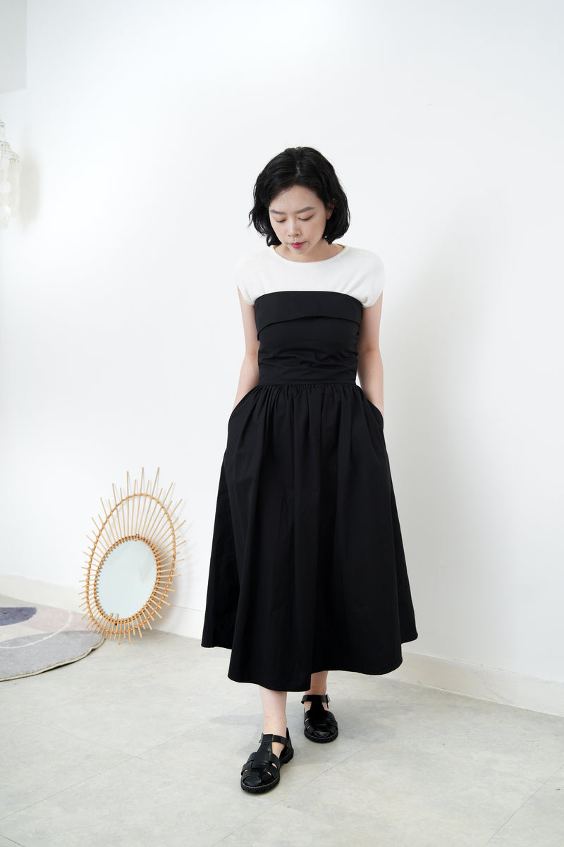 Black layer tube dress in a cut bottom