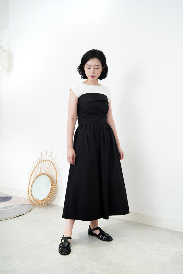 Black layer tube dress in a cut bottom