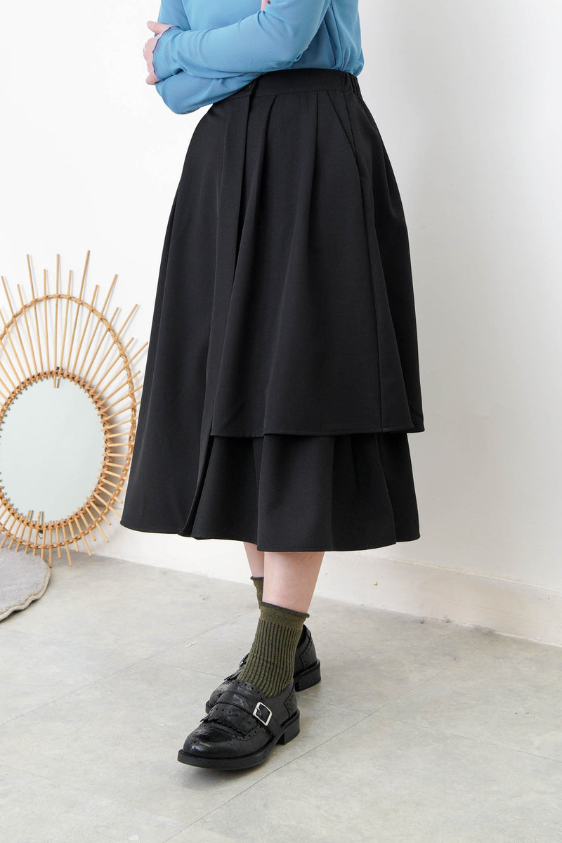 Black A cut skirt in detail cut out layering